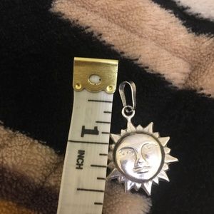 Sterling silver sun charm